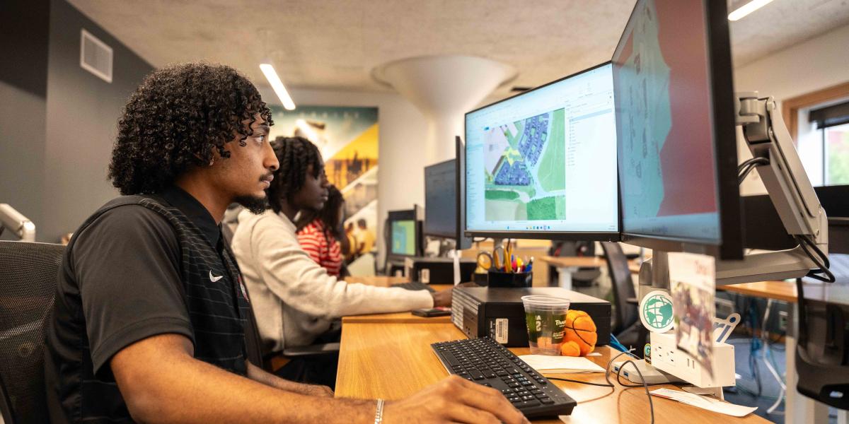 An Ohio State staff member using the Geographic Information System (GIS)