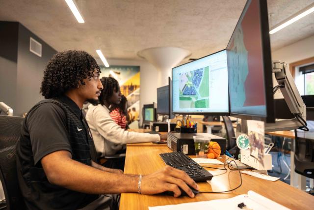 An Ohio State staff member using the Geographic Information System (GIS)
