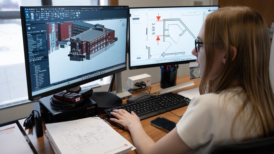 Olivia Miller compares Autodesk renderings with campus mapping data to help verify facility information.
