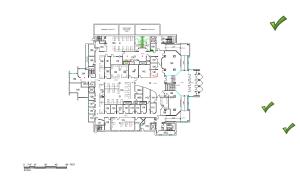 Plan without title block and green check marks indicating areas where text was removed